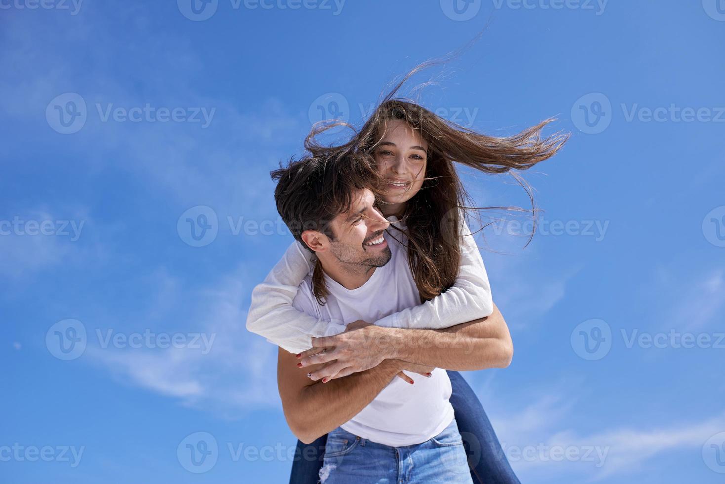 happy young romantic couple have fun arelax  relax at home photo
