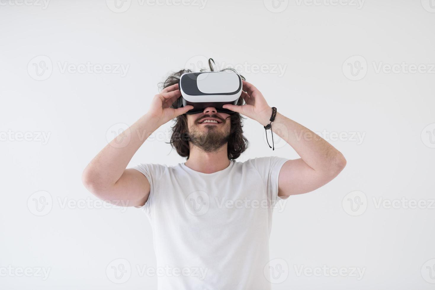 Man using headset of virtual reality photo