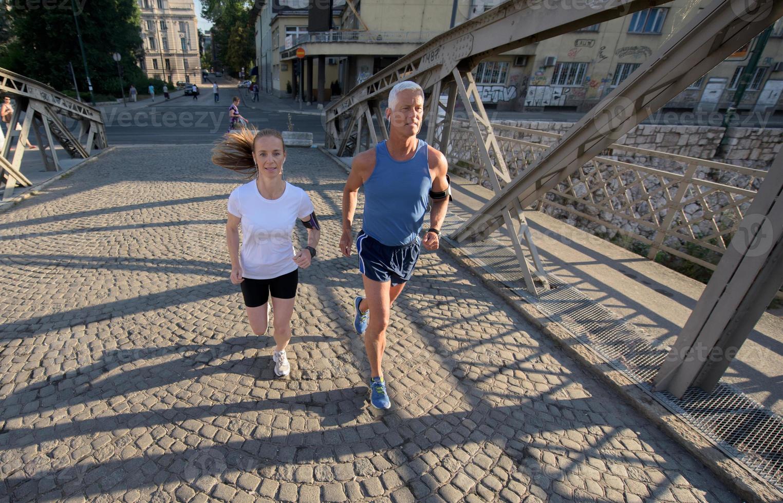 Couple jogging outside photo