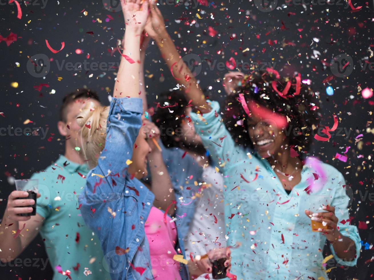 confetti party multiethnic group of people photo