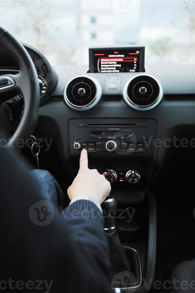 man using car navigation photo
