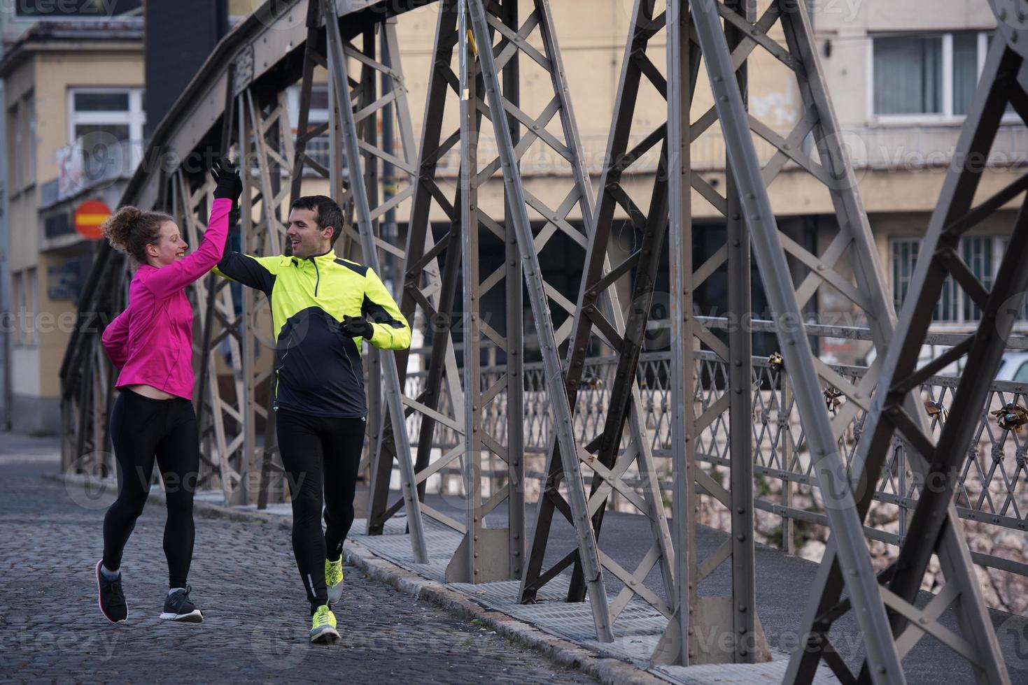 young  couple jogging photo