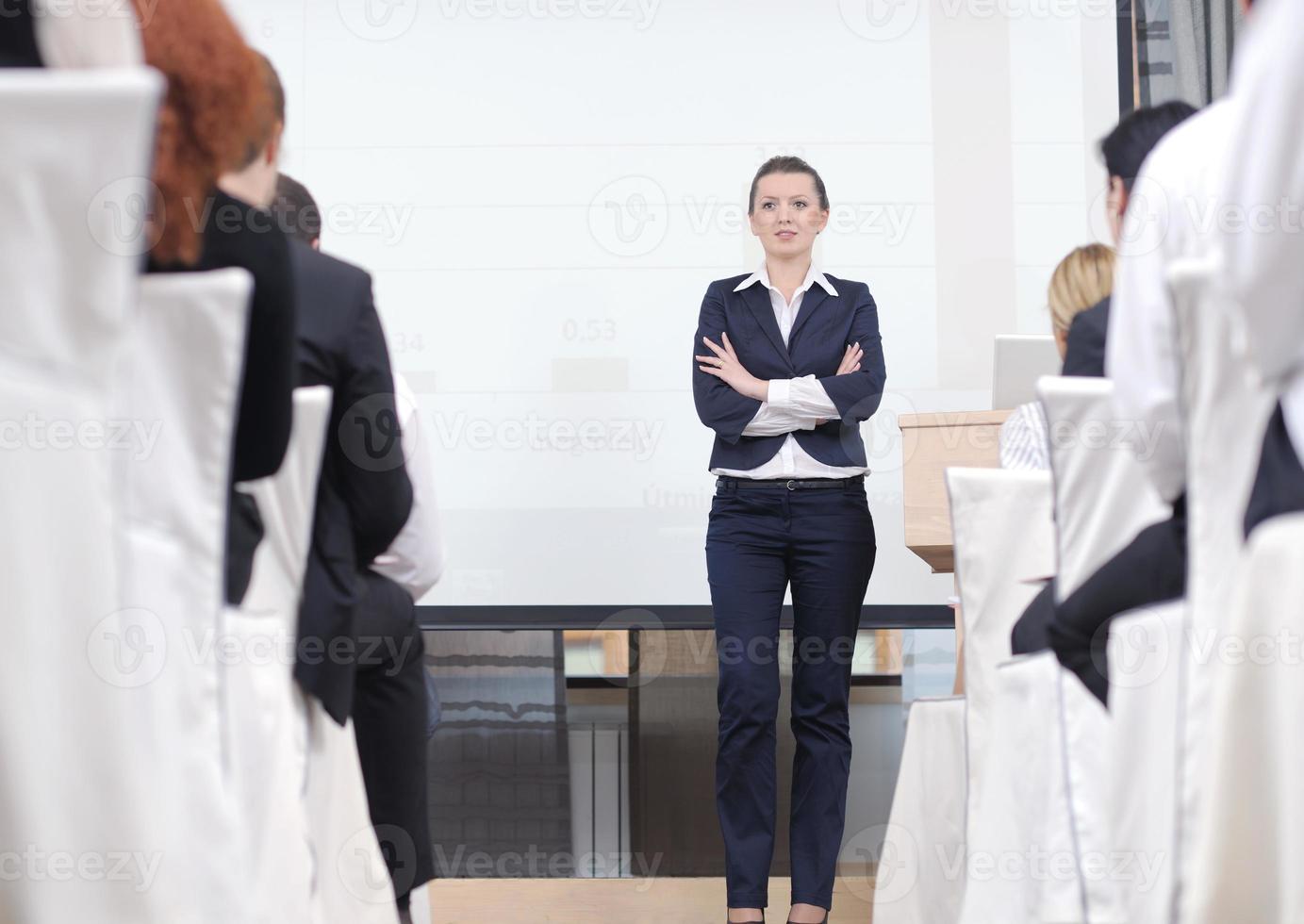 business woman giving presentation photo