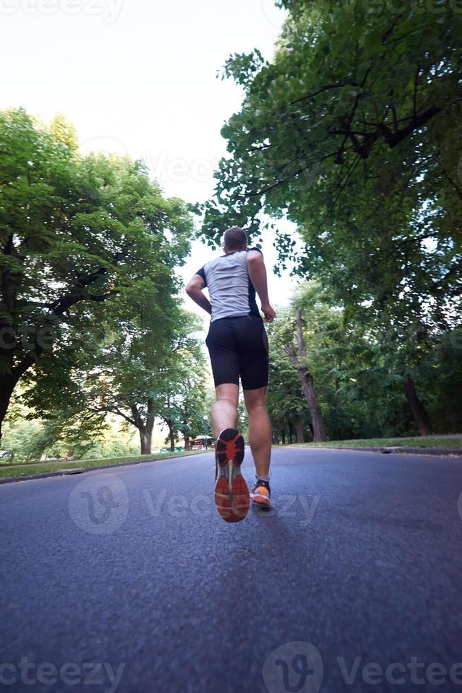man jogging outside photo