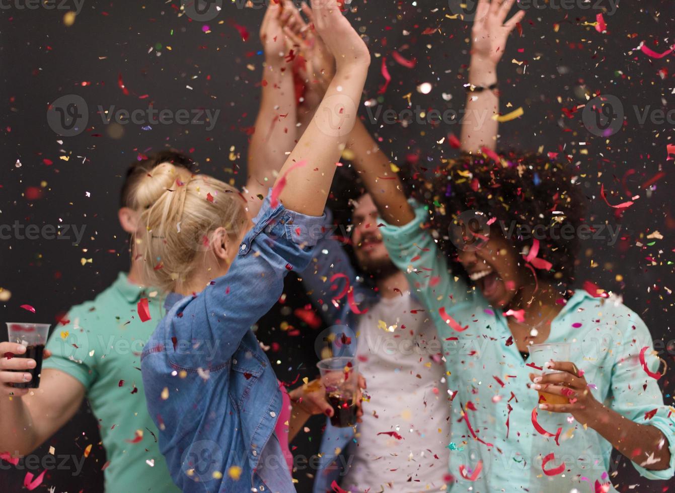 confetti party multiethnic group of people photo