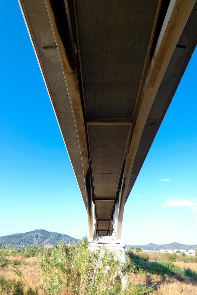 Modern river bridge, an engineering feat that thousands of vehicles pass over daily photo