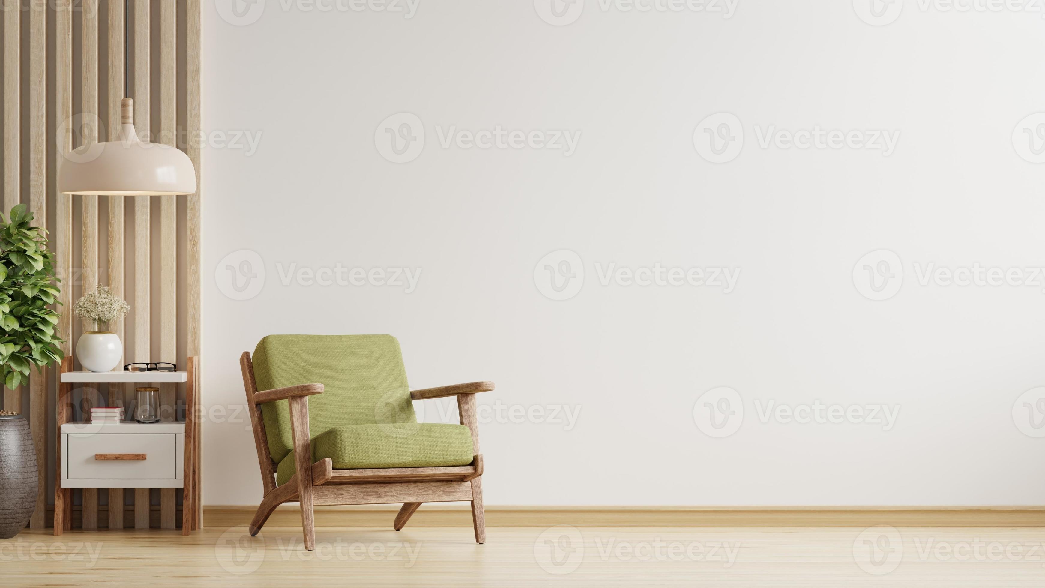 Living room has a green armchair on empty white color wall background