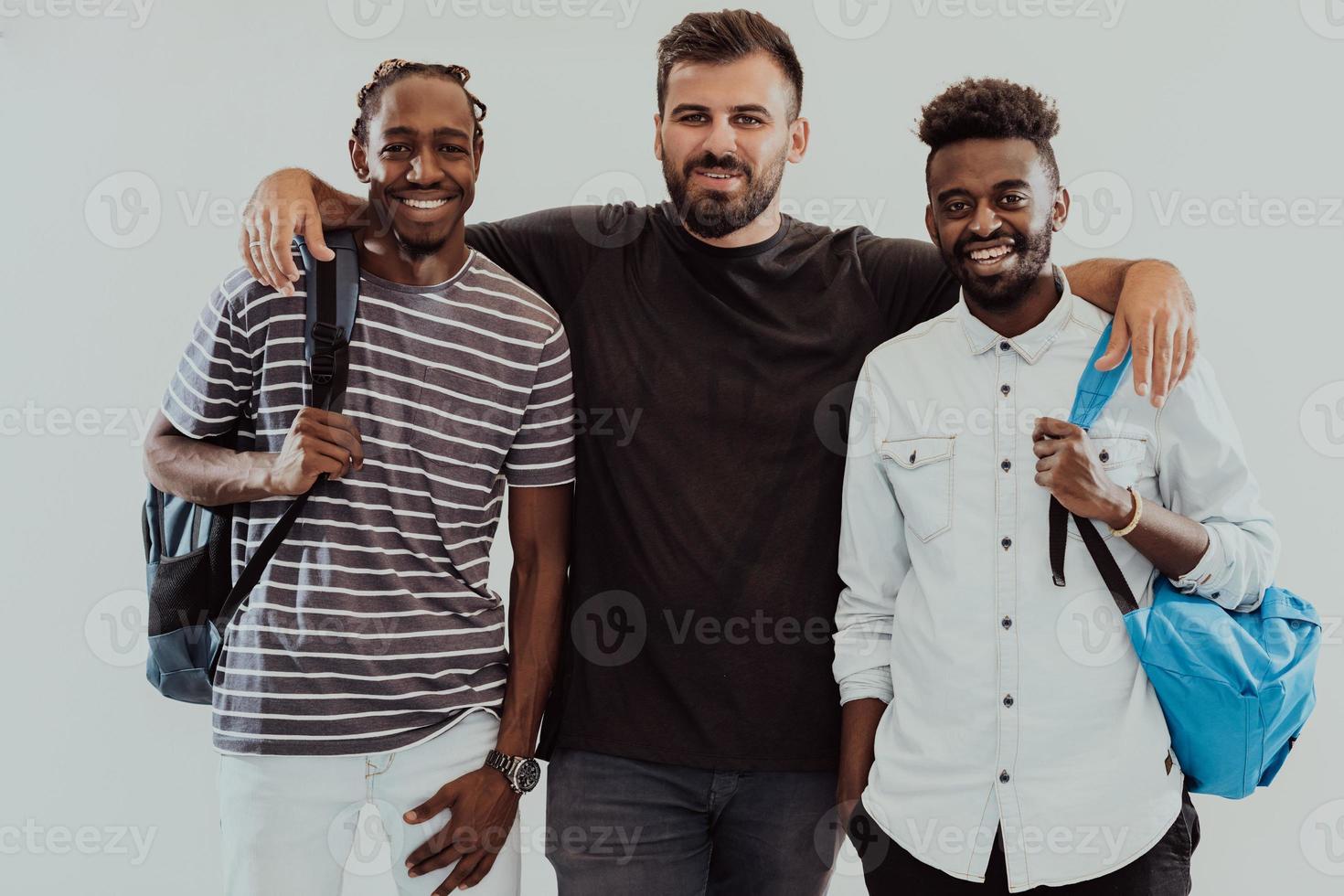 A photo of a group of happy students isolated on white background.