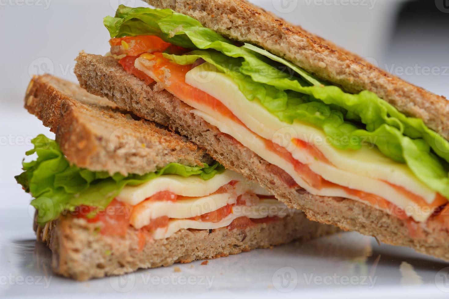 sandwich on a white surface photo