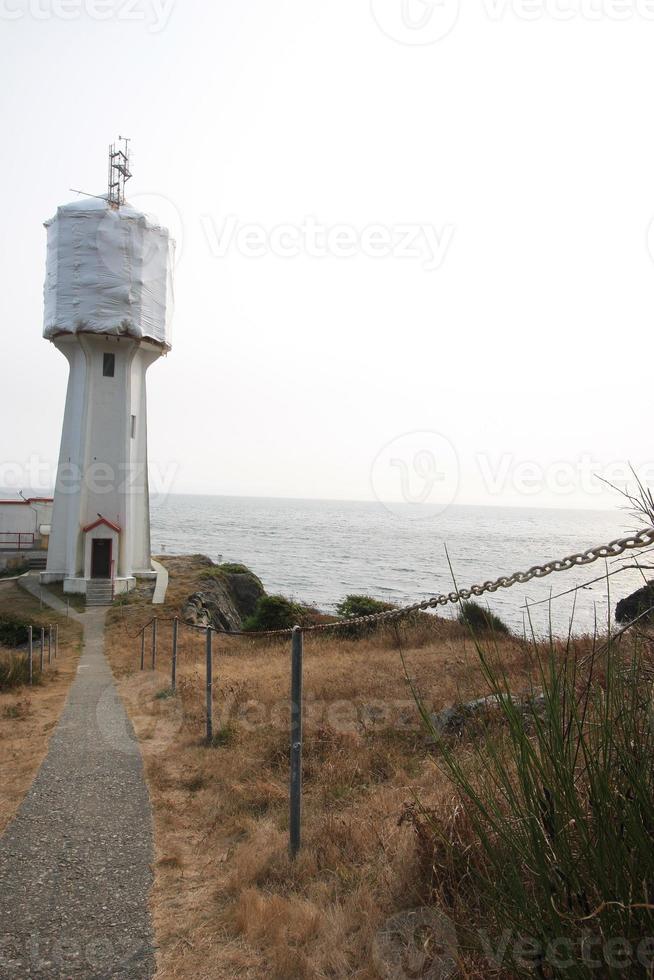 A old west coast lighthouse under repair. photo