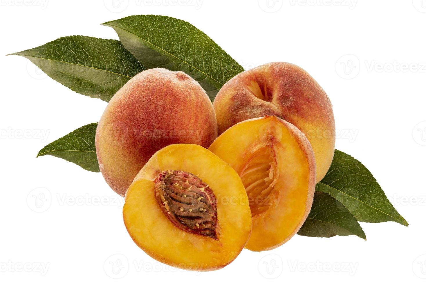 fresh peaches with leaves isolated photo