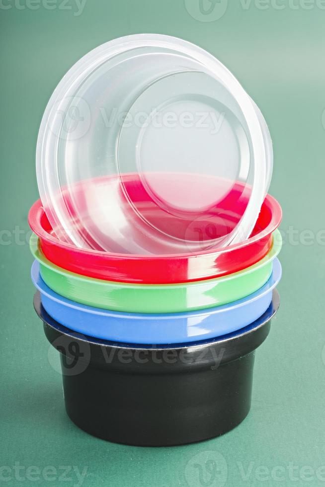 plastic containers of different colors photo