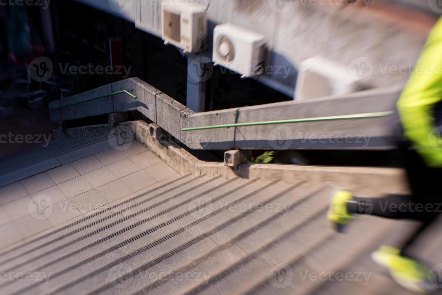 man jogging on steps photo