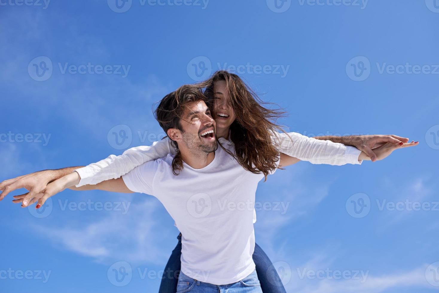 happy young romantic couple have fun arelax  relax at home photo