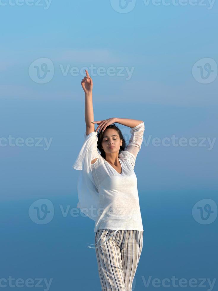 young woman enjoy sunset photo