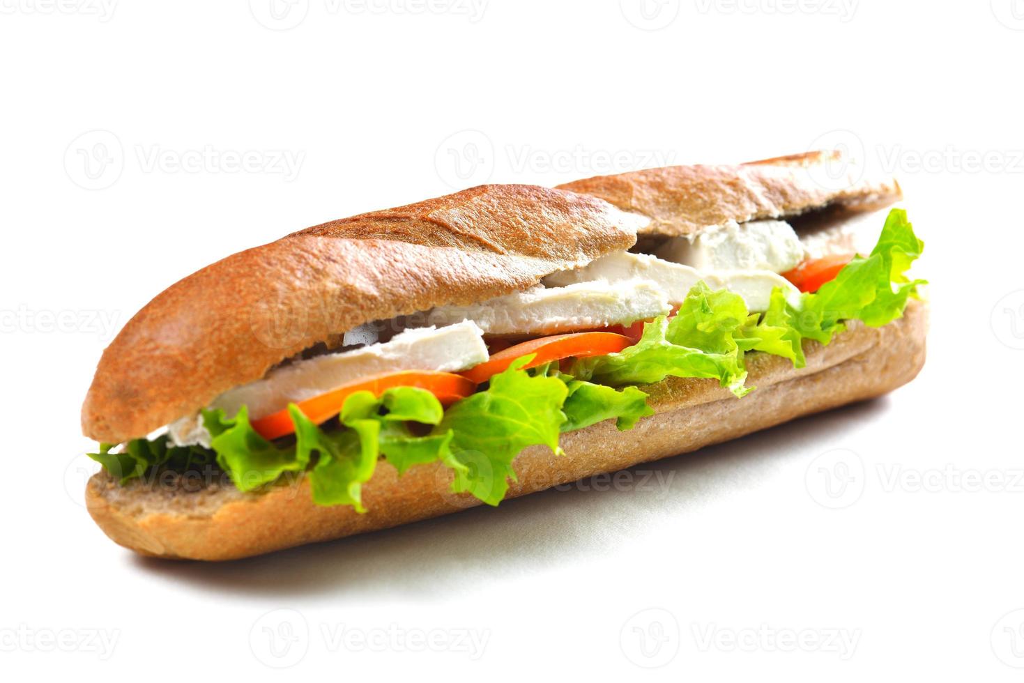 sándwich sobre una superficie blanca foto