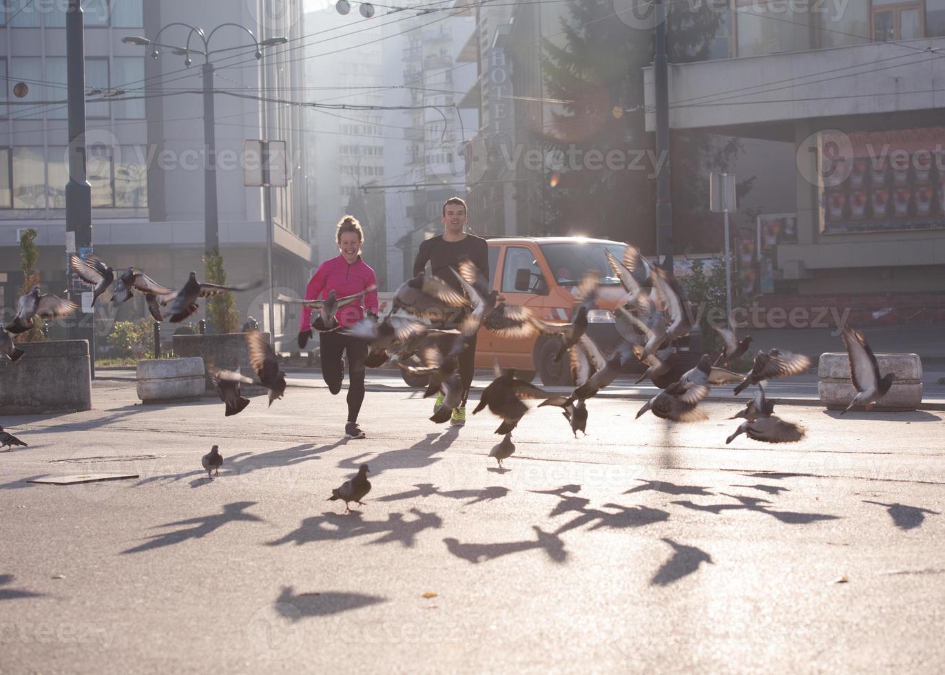 young  couple jogging photo