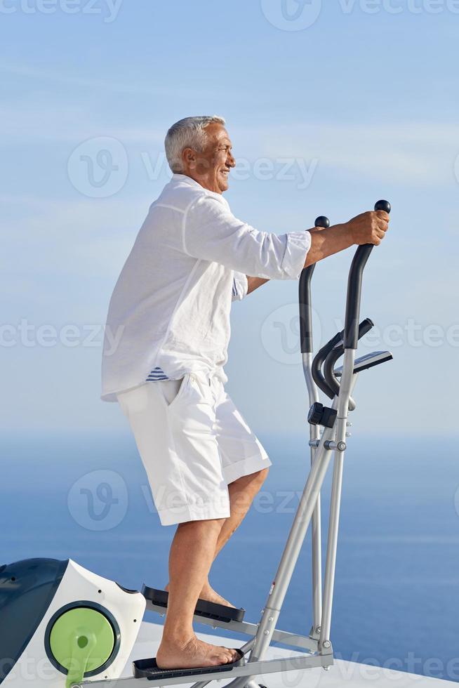 healthy senior man working out photo