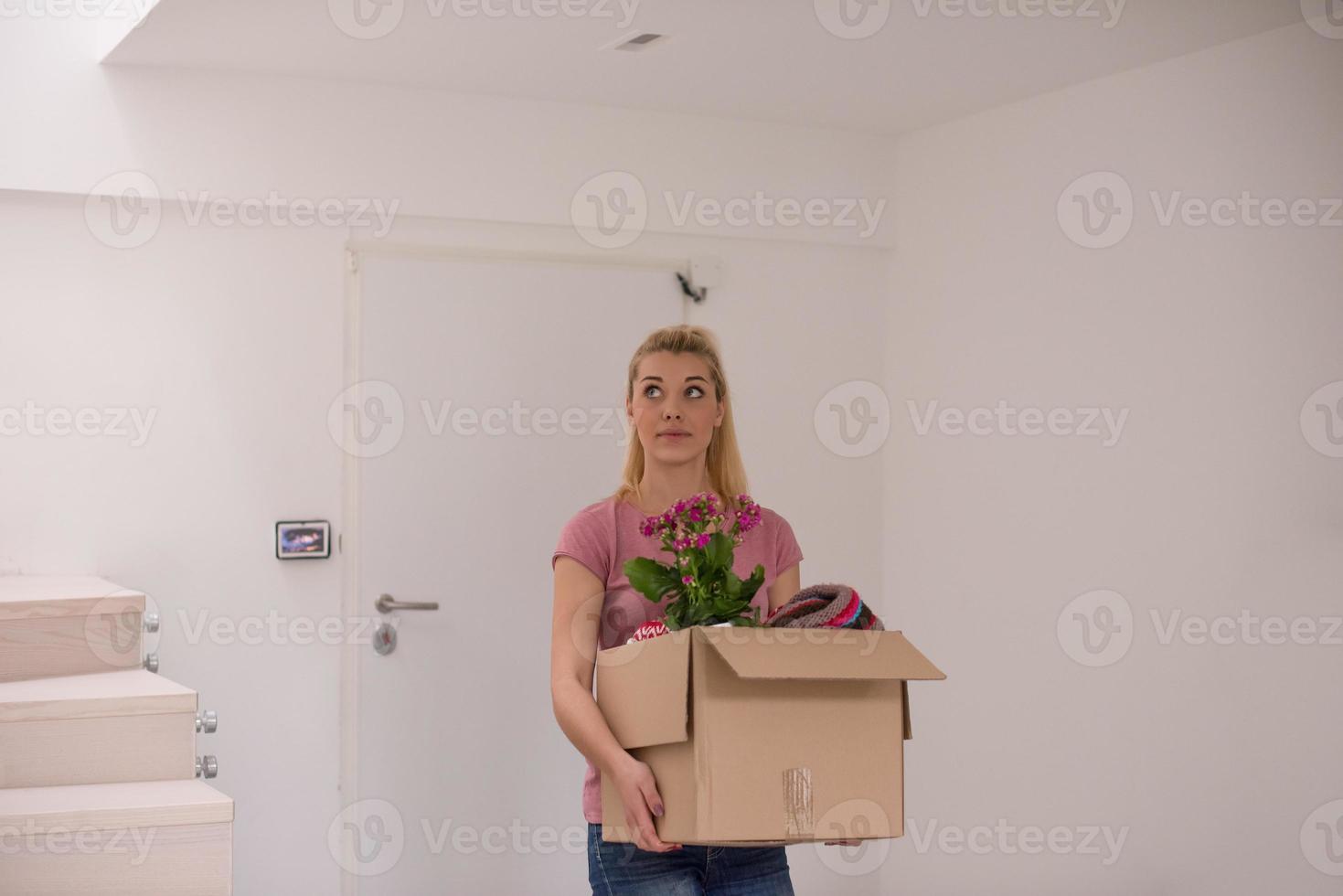 girl moving in the new apartment photo