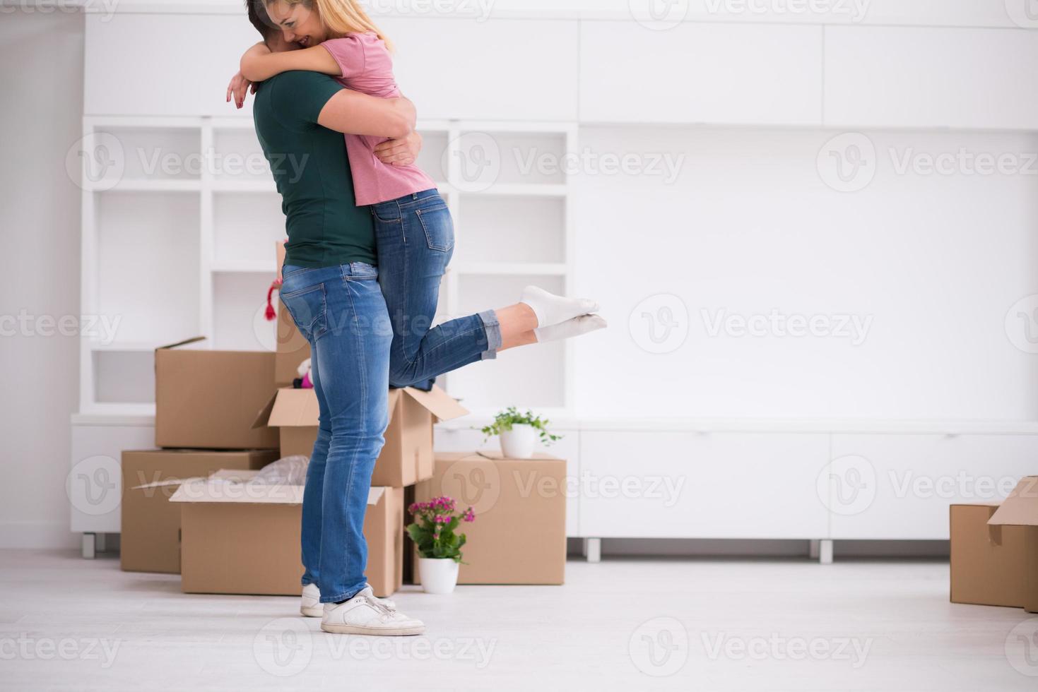 happy Young couple moving in new house photo