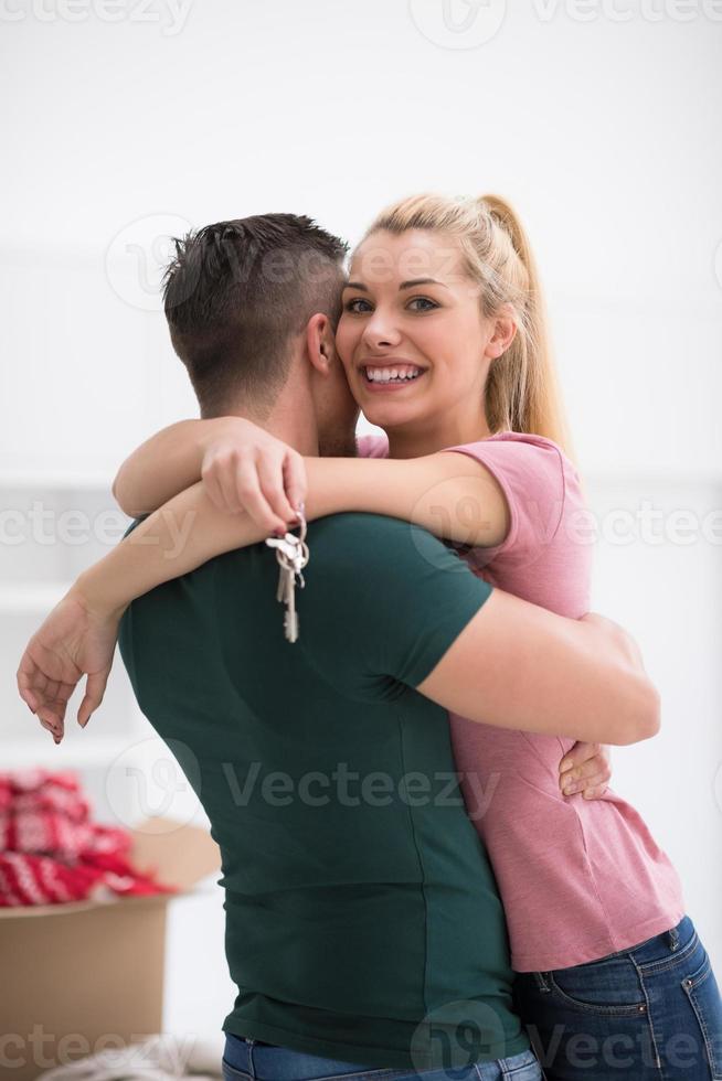 happy Young couple moving in new house photo