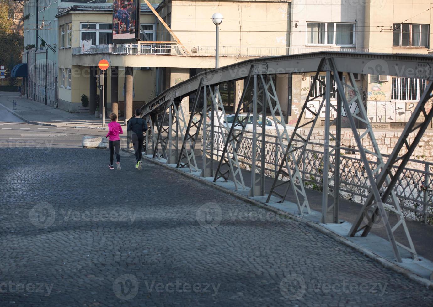 young  couple jogging photo