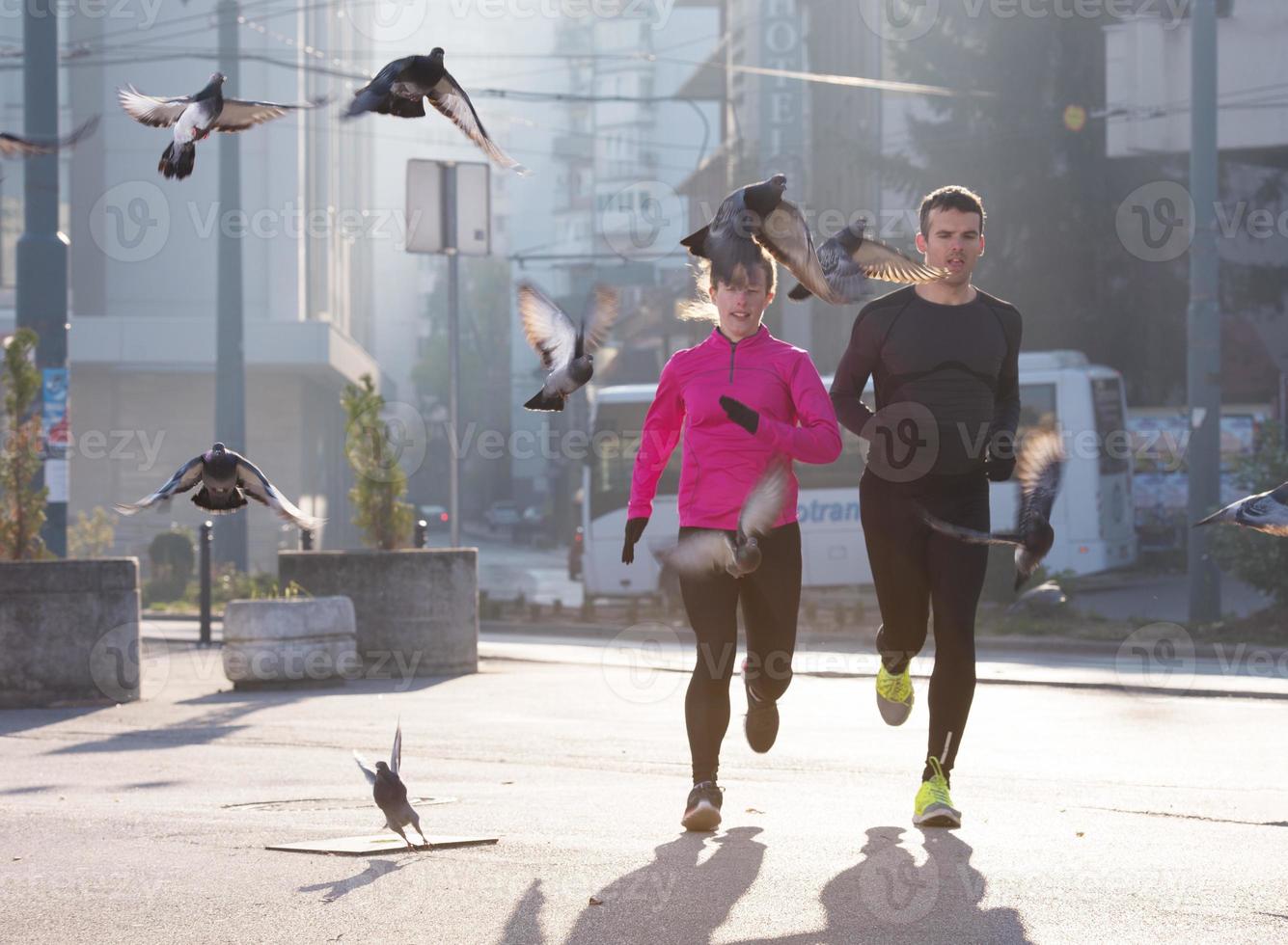 young  couple jogging photo