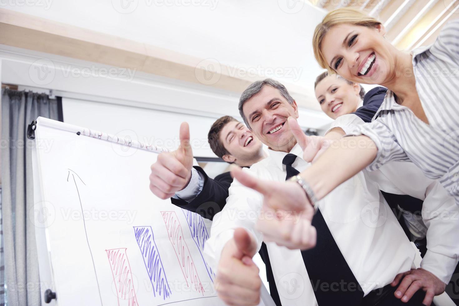 Senior business man giving a presentation photo