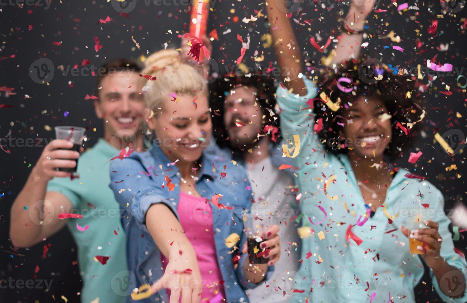 confetti party multiethnic group of people photo