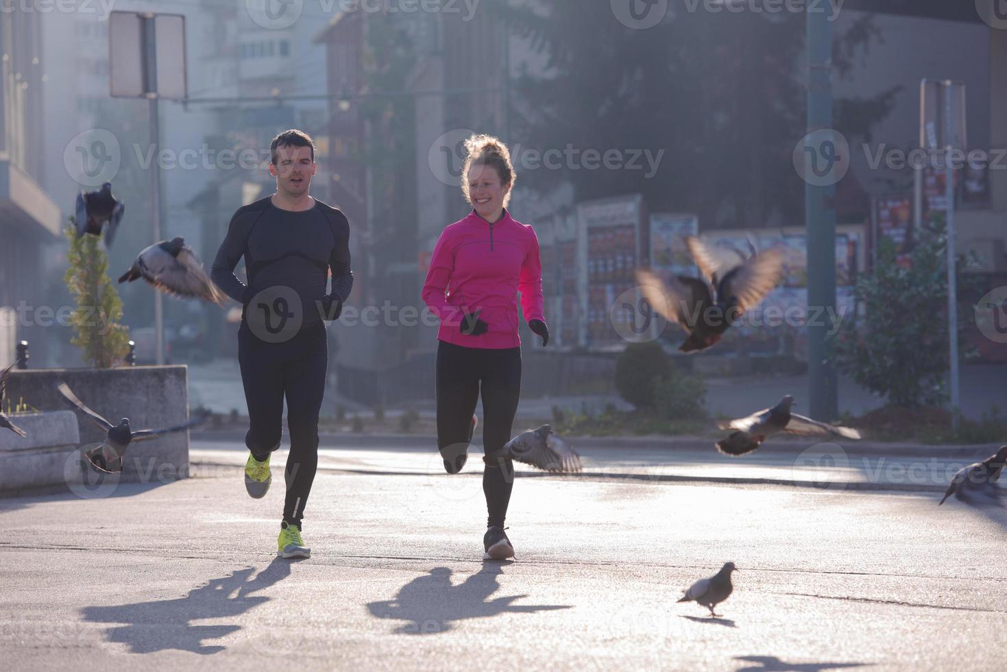 young  couple jogging photo