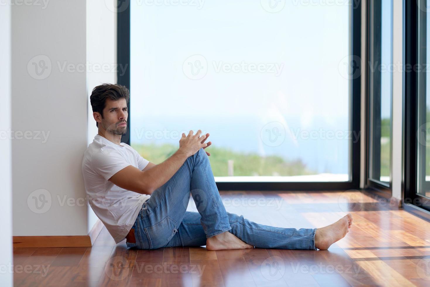 relaxed young couple at home staircase photo