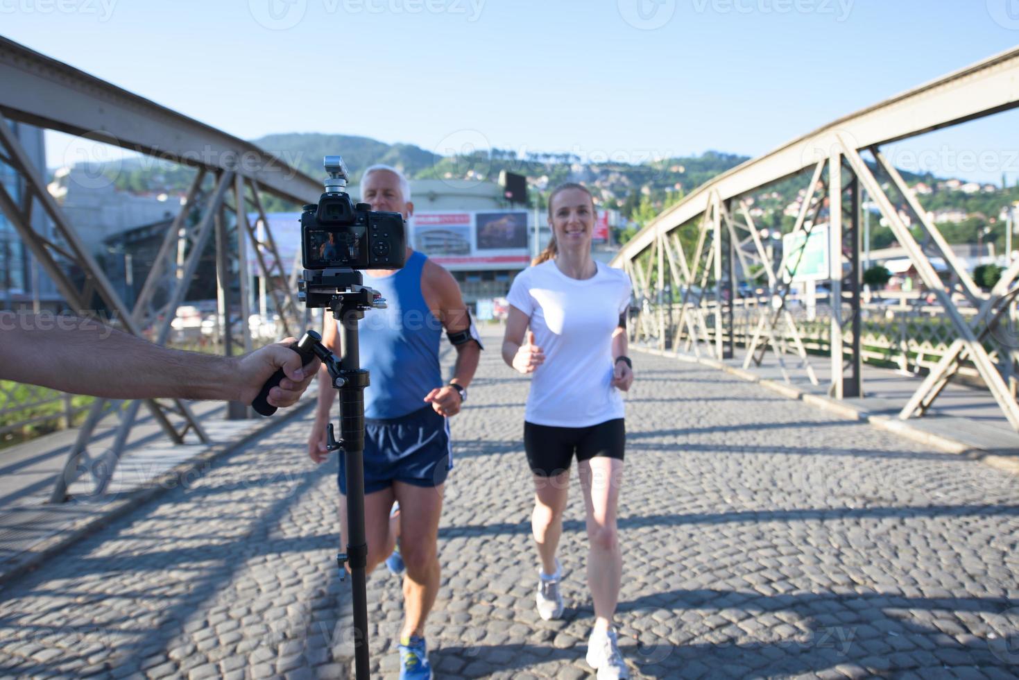 Couple jogging outside photo