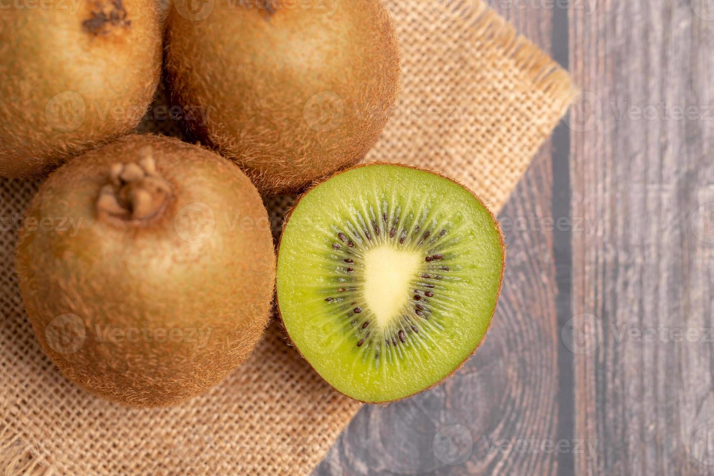 A half of kiwi on the table photo