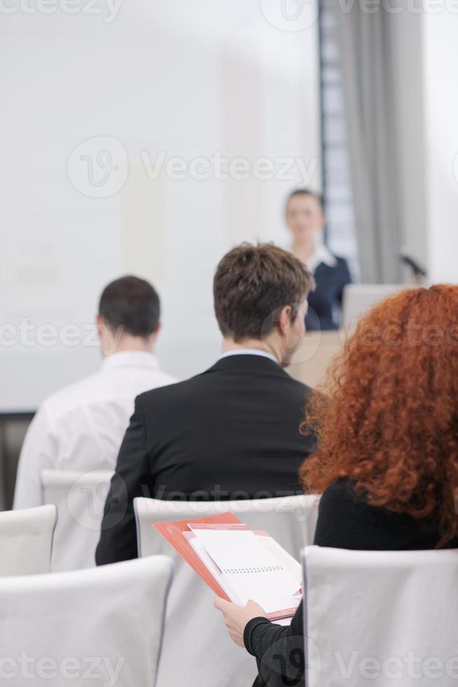 business woman giving presentation photo