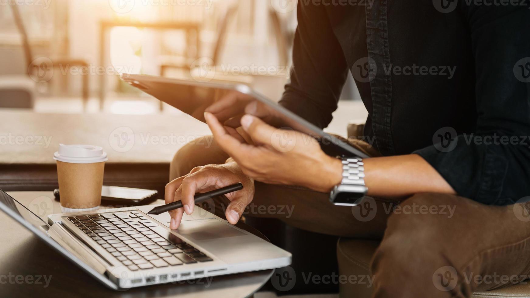 business documents on office table with smart phone and digital tablet and graph financial and Human working photo