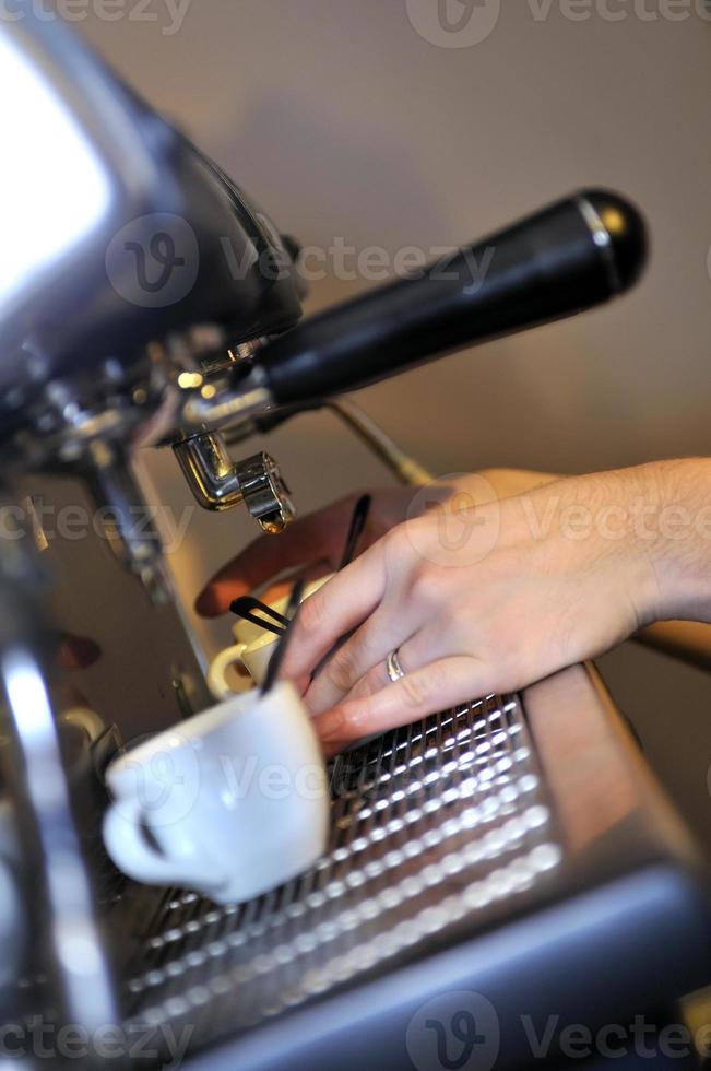 Espresso being poured photo