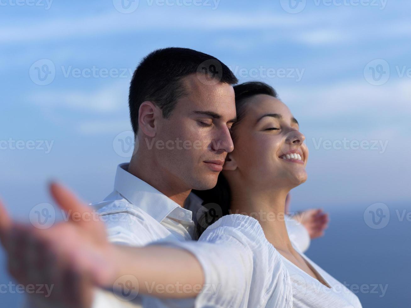 happy young romantic couple have fun arelax  relax at home photo
