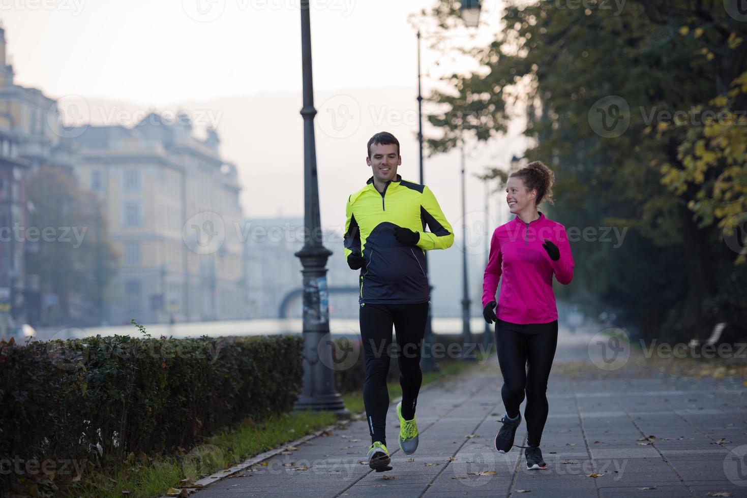 young  couple jogging photo