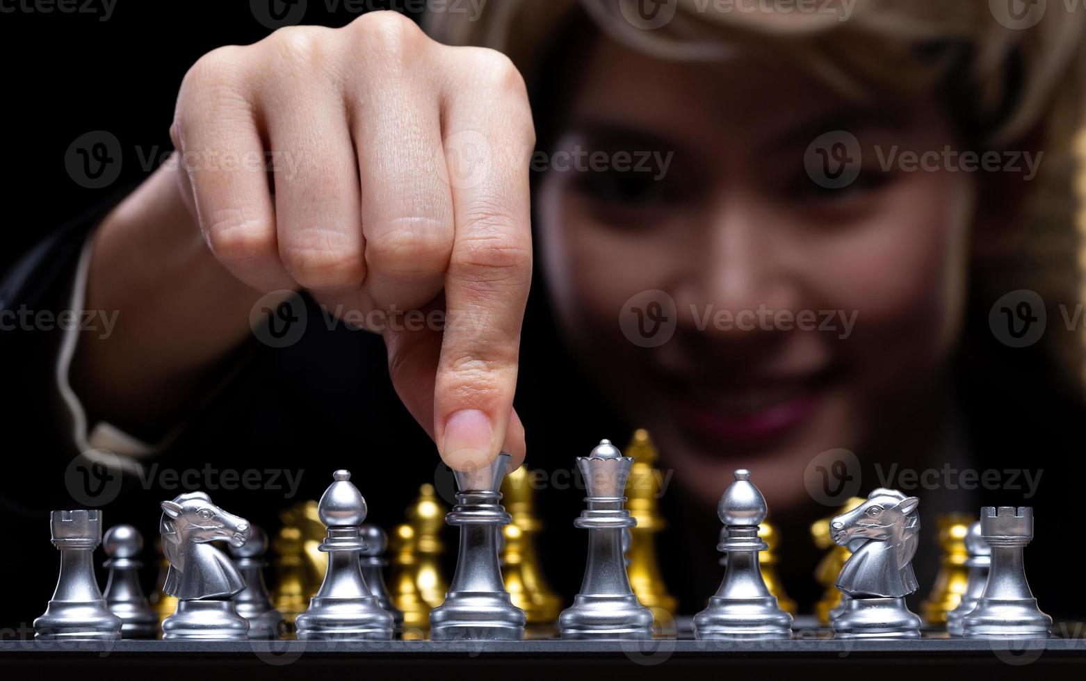 Business woman play Chess with close up Hand. Leader use strategy game to challenge competitor with intelligence leadership to move King to victory with management team idea fight, copy space photo