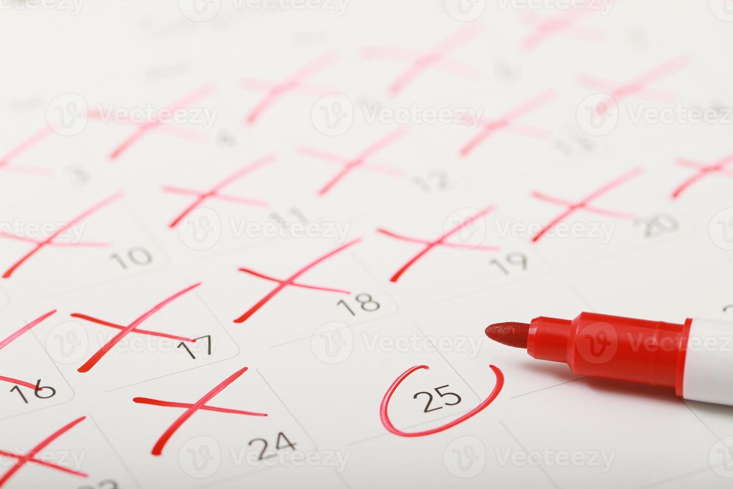 mark the event day with a pin red. Thumbtack in calendar concept for busy timeline organize schedule,appointment and meeting reminder. planning for business meeting or travel holiday planning concept. photo