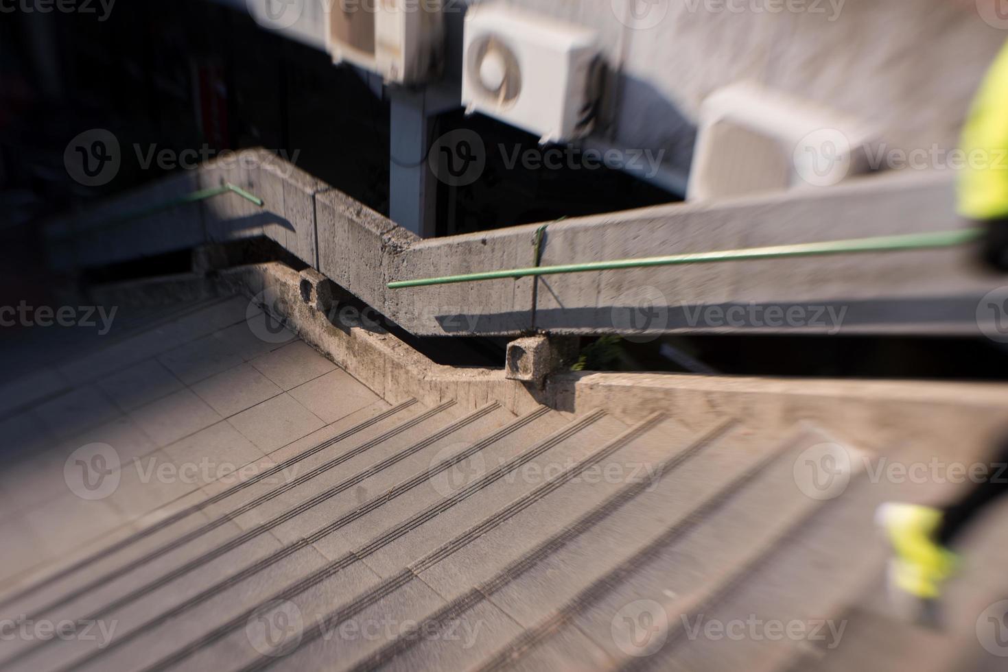 man jogging on steps photo