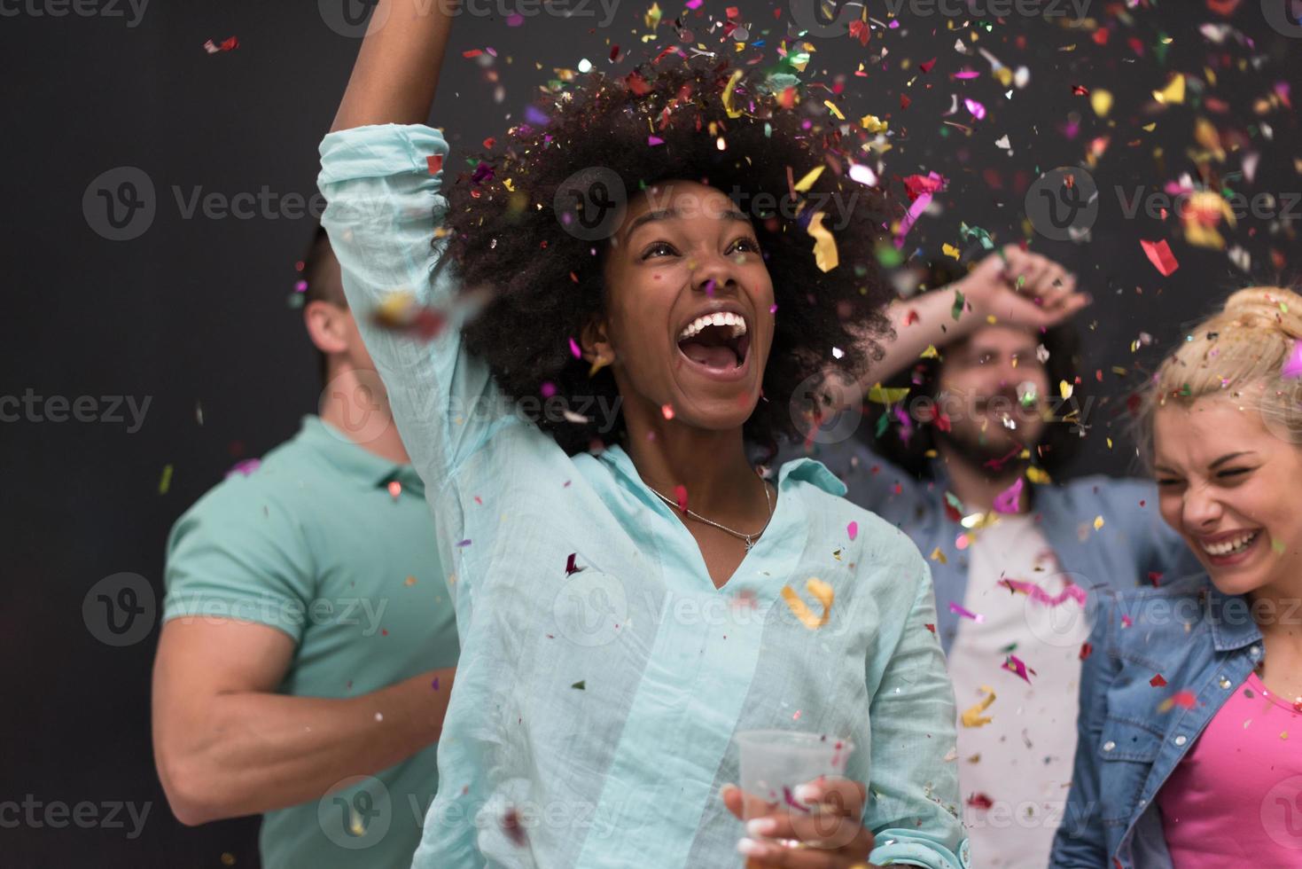 confetti party multiethnic group of people photo