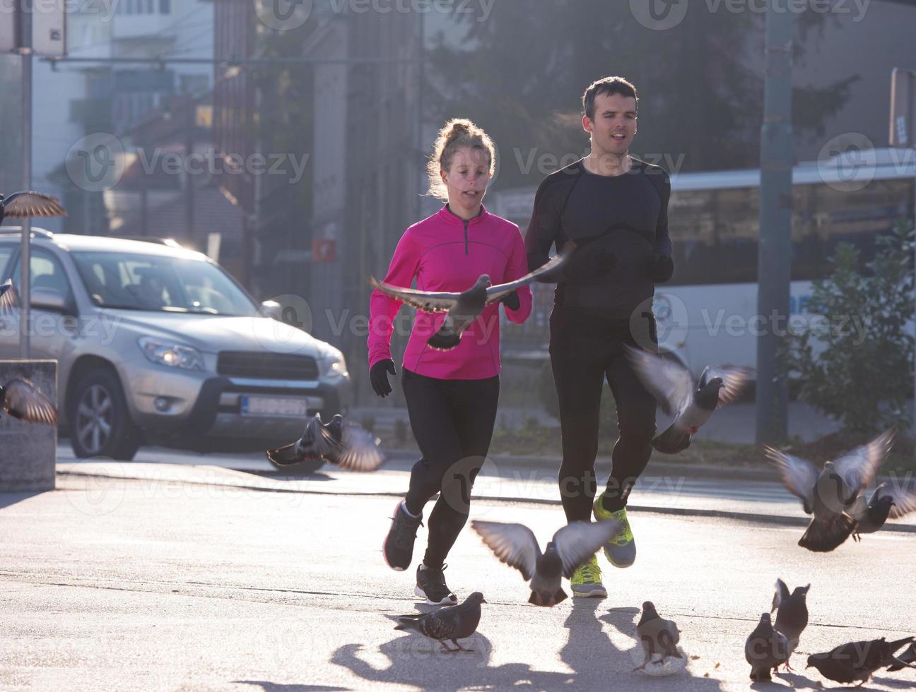 young  couple jogging photo