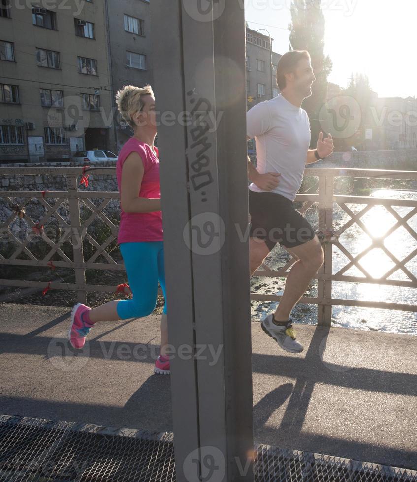 Couple jogging outside photo