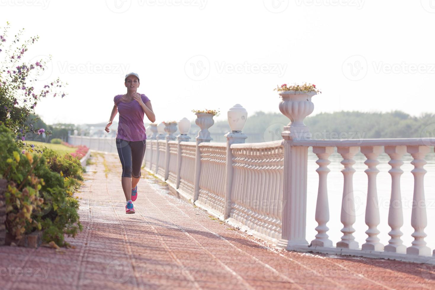 sporty woman jogging photo