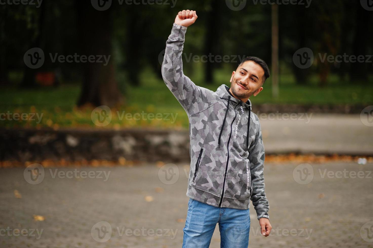 Student kuwaiti man wear at hoodie hands up. photo