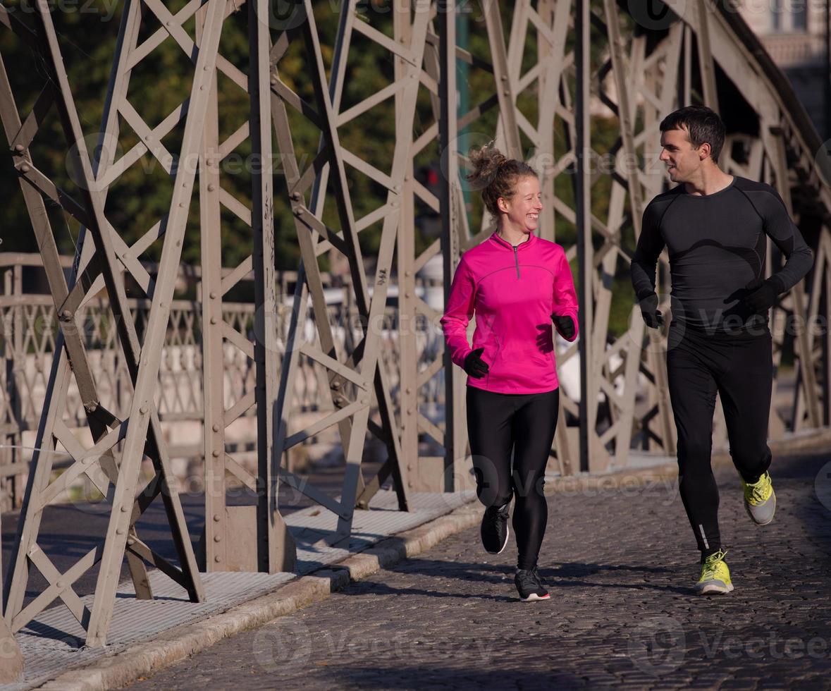 young  couple jogging photo