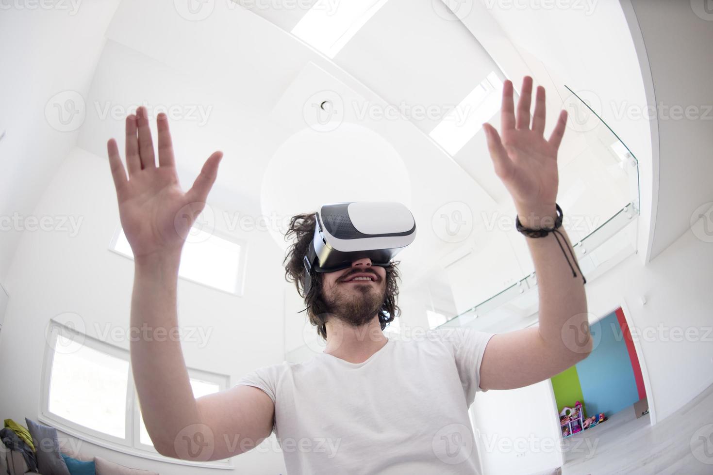 man using VR-headset glasses of virtual reality photo