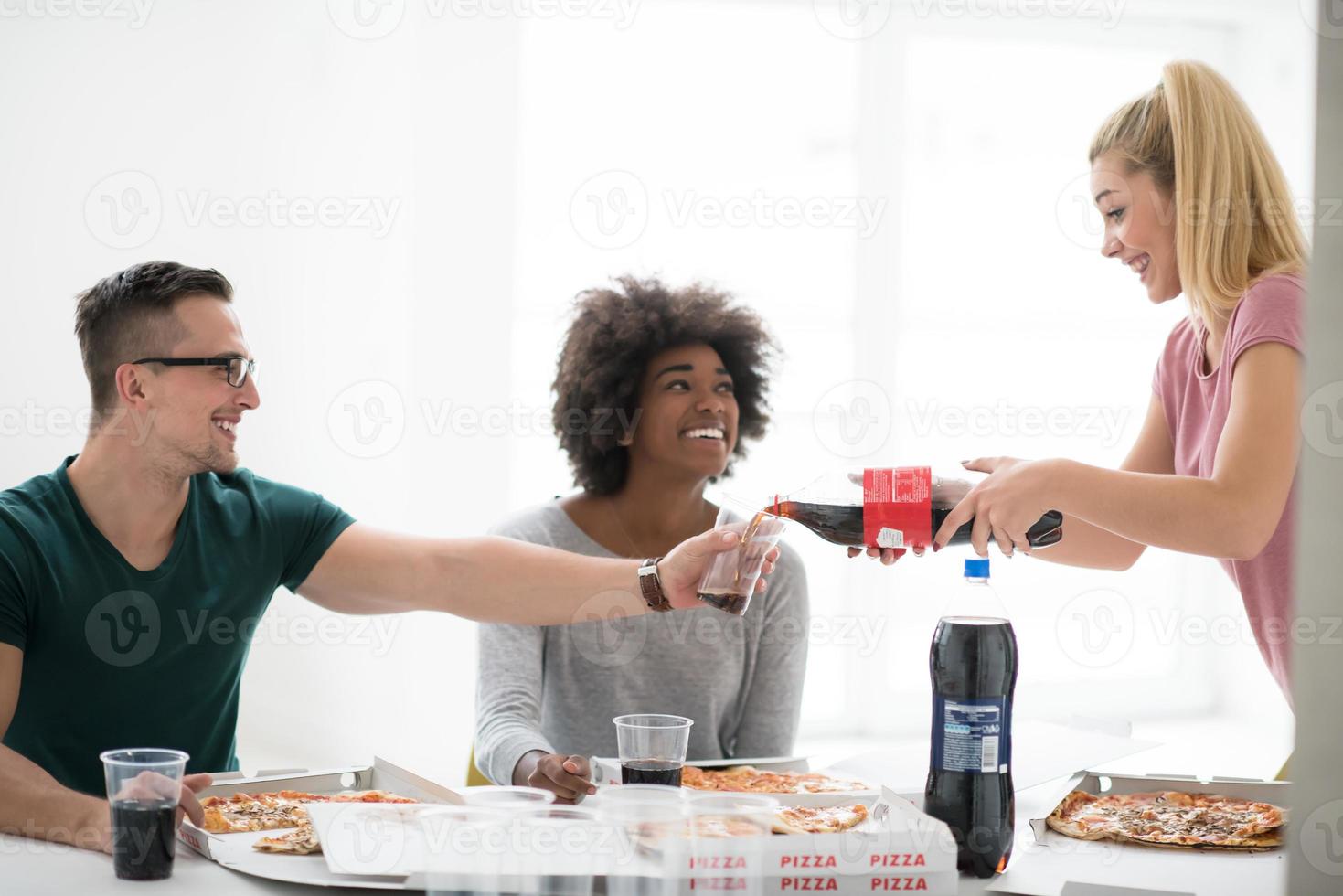 multiethnic group of young people have a lunch break photo