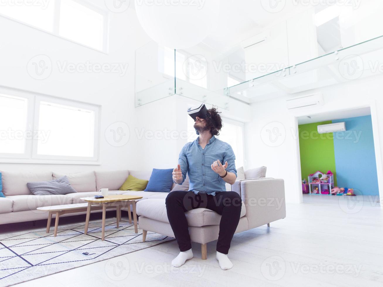 man using VR-headset glasses of virtual reality photo